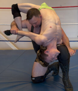 Lifting gay wrestling submission hold